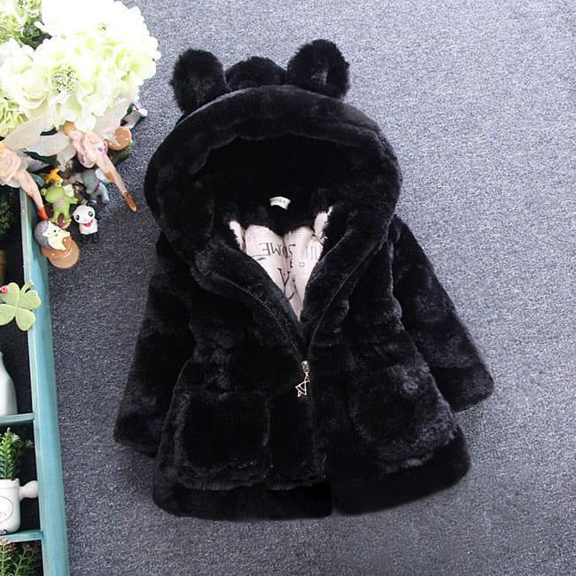 A Girl's Fur Coat for Autumn Winter